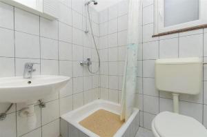 Koupelna v ubytování Apartments Nada