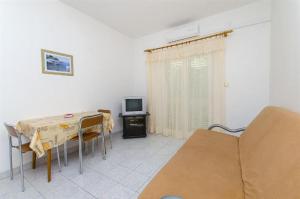 TV a/nebo společenská místnost v ubytování Apartments Nada