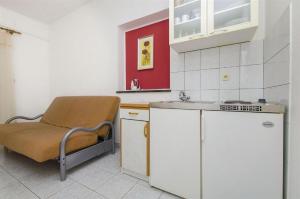 Kuchyň nebo kuchyňský kout v ubytování Apartments Nada