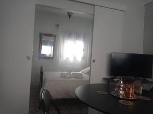 Televízia a/alebo spoločenská miestnosť v ubytovaní Centro de Málaga - Calle Zanca