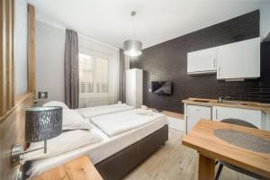 Postel nebo postele na pokoji v ubytování Park Hotel Ambrózia
