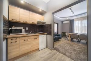 Kuchyň nebo kuchyňský kout v ubytování Park Hotel Ambrózia