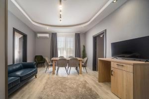 TV a/nebo společenská místnost v ubytování Park Hotel Ambrózia