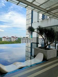 a pool on the roof of a building at TWIN GALAXY JB Homestay by SUMMER in Johor Bahru