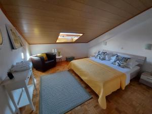 Llit o llits en una habitació de Apartments Villa Dona