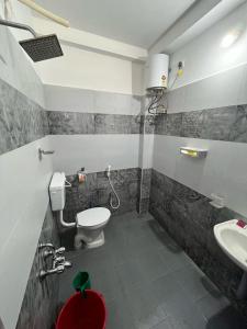 Koupelna v ubytování Chez Prabha Homestay