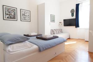 TV a/nebo společenská místnost v ubytování Milla Rooms