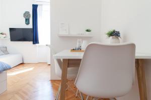 TV a/nebo společenská místnost v ubytování Milla Rooms