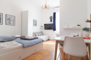 TV a/nebo společenská místnost v ubytování Milla Rooms