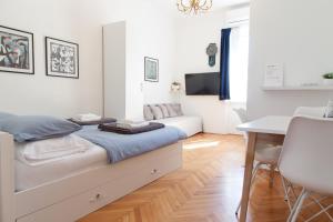 TV a/nebo společenská místnost v ubytování Milla Rooms