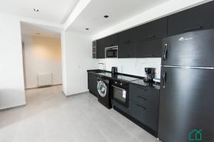 A cozinha ou cozinha compacta de Sunset 302 Apt de luxe avec salle de fitness