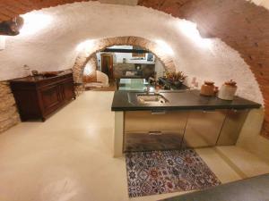 Kuchyň nebo kuchyňský kout v ubytování Luxury Loft Lerici "Il vecchio frantoio"