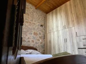 A bed or beds in a room at Find your peace in a traditional country house!!