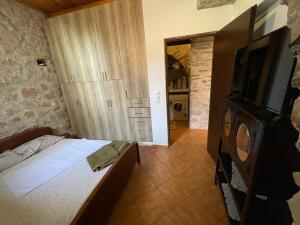 A bed or beds in a room at Find your peace in a traditional country house!!