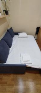 Łóżko lub łóżka w pokoju w obiekcie Tranquilo apartamento Pacífico/Ciudad de Barcelona