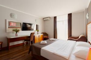 Voodi või voodid majutusasutuse Hotel 19 Batumi toas