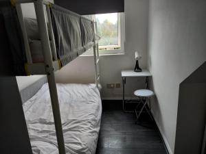 Postel nebo postele na pokoji v ubytování Byron View House