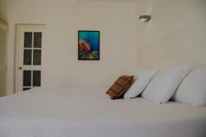 Agua Dorada Beach Hotel By Lidotel客房内的一张或多张床位