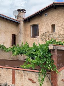 a building with a sign in front of it at gîte du Cady in Casteil