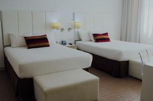 Agua Dorada Beach Hotel By Lidotel客房内的一张或多张床位