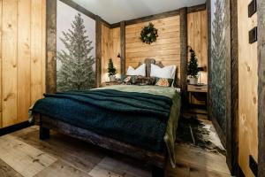 Postel nebo postele na pokoji v ubytování Brzozowa Osada - Premium Chalets Zakopane + 37 fotografií