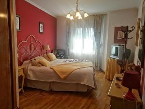 Posteľ alebo postele v izbe v ubytovaní Piso Vacacional O Salnes