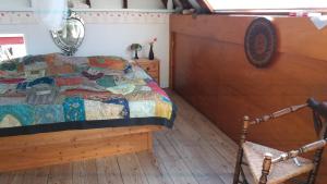 เตียงในห้องที่ De Geheime Tuin - Uitzicht