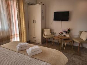 Ein Bett oder Betten in einem Zimmer der Unterkunft Rooms Sapina