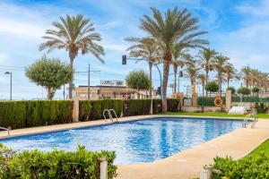 Bazén v ubytovaní Spacious apartment in El Campello, 120 m², shared pool alebo v jeho blízkosti