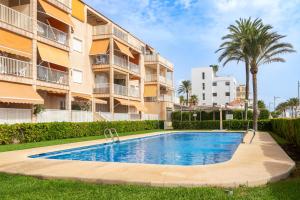 Bazén v ubytovaní Spacious apartment in El Campello, 120 m², shared pool alebo v jeho blízkosti