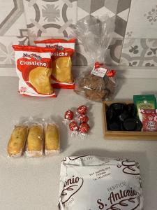 a group of food items on a counter with at Catanese Proverb's House - Via Napoli in Catania