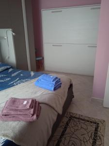 Postel nebo postele na pokoji v ubytování Zena