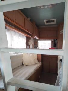 a view of a bunk bed in an rv at Love in the Camper in Florence