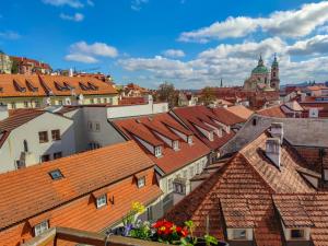 Nespecifikovaný výhled na destinaci Praha nebo výhled na město při pohledu z hotelu