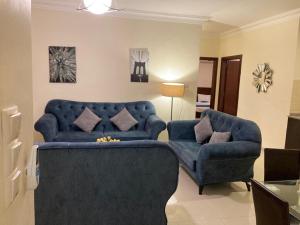 منطقة جلوس في Uptown Hotel Apartment