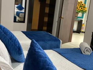 Postel nebo postele na pokoji v ubytování Hotel Casa Lamay + 11 fotografií