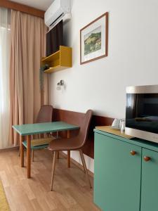TV a/nebo společenská místnost v ubytování Hello Balcsi Apartmanház