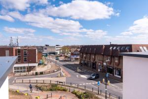 a view of a city street with buildings at Super High End 1 bed with Balcony - Central West Bridgford in Nottingham