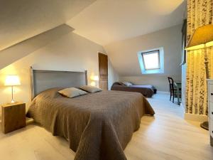 Posteľ alebo postele v izbe v ubytovaní Pressoir de la mare SUPERHOTE 12 minutes de Cabourg