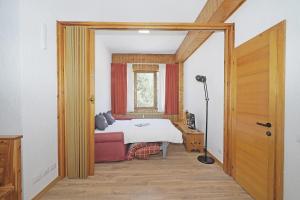 Postel nebo postele na pokoji v ubytování iFlat Apartment Madonna di Campiglio Adamello 1