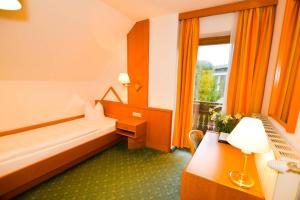 Posteľ alebo postele v izbe v ubytovaní HOTEL Jerolitsch + 37 fotografií