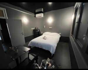 Letto o letti in una camera di Logements des choraux