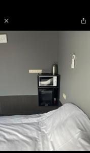 Letto o letti in una camera di Logements des choraux