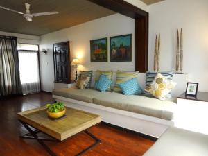 Ein Sitzbereich in der Unterkunft Suite Lanka