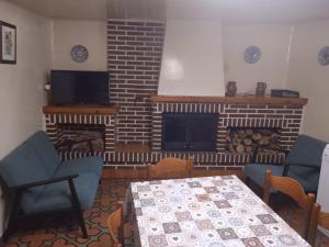 Posezení v ubytování CASA LACAMBRA + 8 fotografií