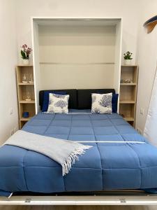 A bed or beds in a room at Casa nel Golfo - free parking