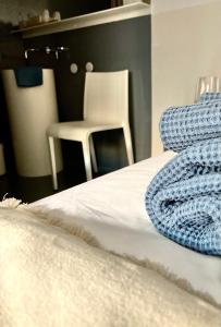 Postel nebo postele na pokoji v ubytování Le4bergheim Chambre d'hôtes