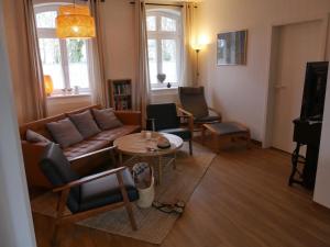 Posezení v ubytování Lindenhof Wohnung 2, Erdgeschoß