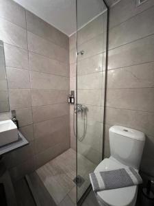 Koupelna v ubytování Aristea Hotel
