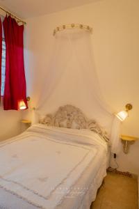 Ένα ή περισσότερα κρεβάτια σε δωμάτιο στο MERLO 2 mare & free park